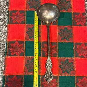 Vintage Silver Ladle with Ornate Handle